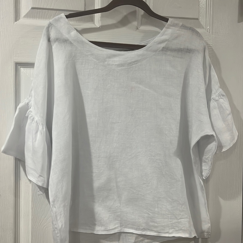 White linen shirt with flared sleeves
